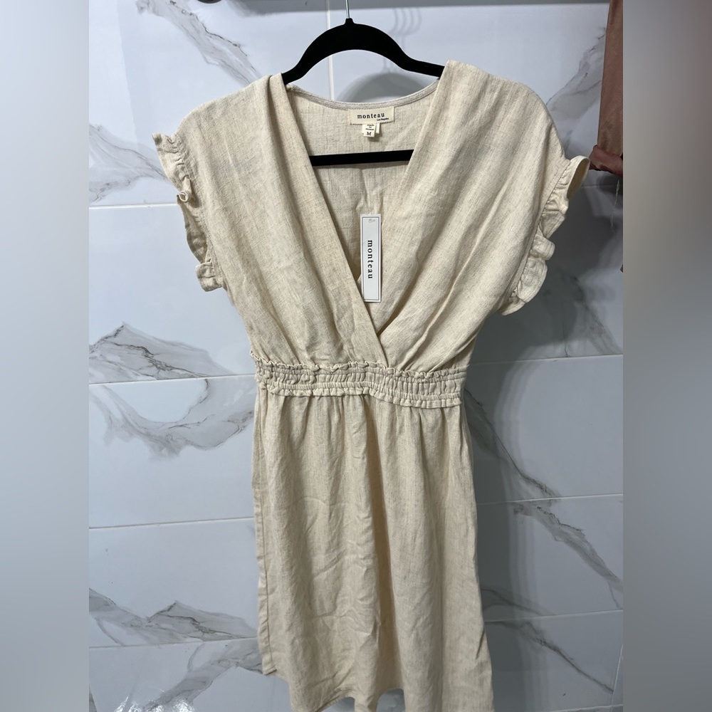 ivory colored monteau dress brand new with tag size medium